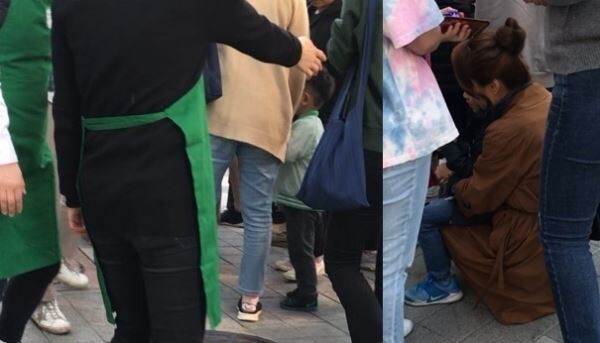 ▲행사 대기행렬에는 어린이 참여자도 있다. 스타벅스는 이들을 위한 별도 대기를 마련하려 했으나 일부 참여자의 반대에 부딪혔다. 대시기간이 길어지자 아이와 함께 바닥에 앉아 대기하는 참여자(사진에서 오른쪽)도 나왔다. [사진=김자혜 기자]